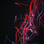 red and blue doodle artwork with black background